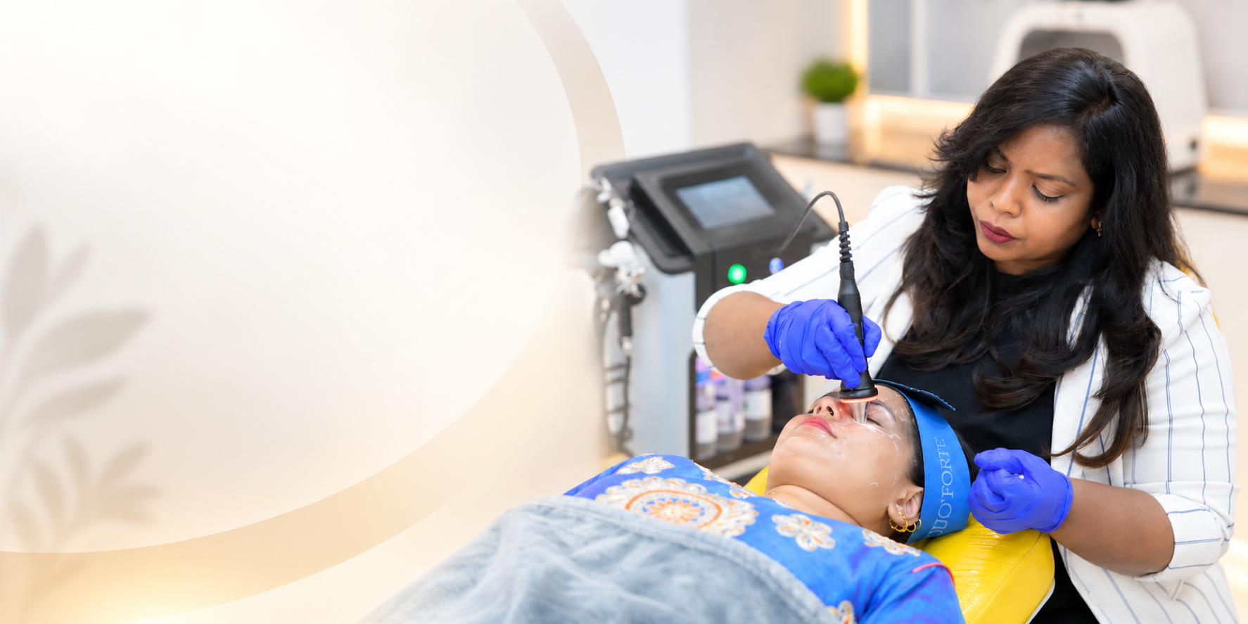 Dr. Premalatha, the best dermatologist in HRBR Layout, treating a patient at PRALASH Dermystique & Dentique